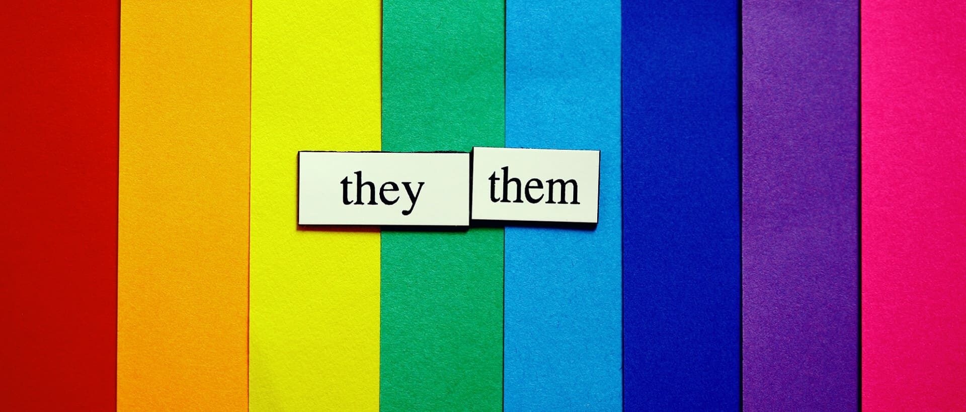 Regenbogenfarben mit geschlechtsneutralen Pronomen für gendergerechte Sprache